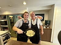 Guests making handmade gyoza at Sorisso in Tokyo