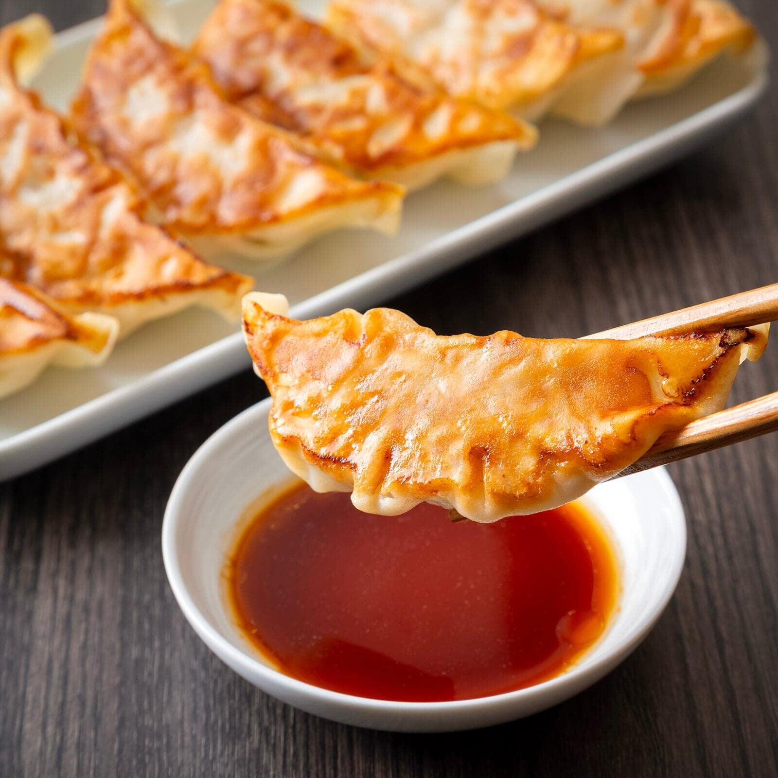 Guests making handmade gyoza at Sorisso in Tokyo